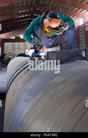 Workers at Hyojong Pipe factory, Doha. Stock Photo
