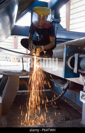 Workers at Hyojong Pipe factory, Doha. Stock Photo