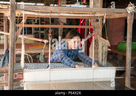 a silk weaving factory at the silk Island or Koh Dach near the city of Phnom Penh of Cambodia.  Cambodia, Phnom Penh, November, 2017, Stock Photo