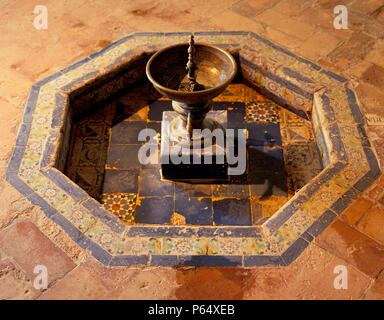 Old fountain with tile flooring,Casa Pilatos,Sevilla,Spain Stock Photo