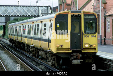 A Merseyrail class 507 electric train is seen here at Birkenhead North station. Stock Photo