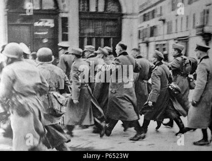 World War two : German prisoners of war marched across the streets of Mulhouse Stock Photo