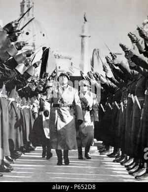 Benito Mussolini, Italian Fascist leader and Prime Minister reviews troops in Rome as Italy expands its military might Stock Photo