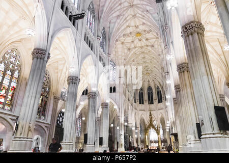 New York City. The Cathedral of St. Patrick, a decorated Neo-Gothic-style Roman Catholic cathedral church in the United States and a prominent landmar Stock Photo
