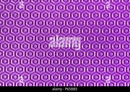 Close-up beautiful geometric purple hexagonal texture. Purple soft playing mat honeycomb textured details Stock Photo