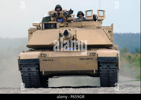 Members of a tank crew with the Tennessee Army National Guard’s H Troop, 2nd Squadron, 278th Armored Cavalry Regiment kick up dust as they race against the clock to their next land navigation point on an M1A1 Abrams tank while competing in the Gen. Gordon Sullivan Cup best tank crew competition at Fort Benning, Ga., Tuesday, May 3, 2016. The Sullivan Cup tests tank crews from throughout the Army on everything from gunnery to mounted land navigation, maintenance and combat casualty care in a variety of physically and mentally challenges setting to determine the Army’s best tank crew. (U.S. Army Stock Photo