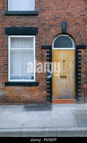 Derelict terraced Victorian houses waiting demolition, Salford, near Manchester, England, UK. Salford's regeneration objective is to ensure that each  Stock Photo