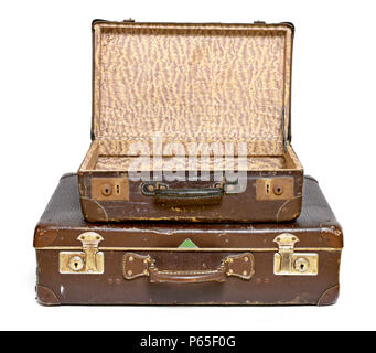 Old suitcases, travel items, luggage or baggage. Vintage suitcases, retro, leather suitcases, isolated on white background. Stock Photo