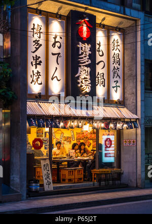 Traditional Japanese restaurant in Tokyo in the evening - TOKYO / JAPAN - JUNE 17, 2018 Stock Photo