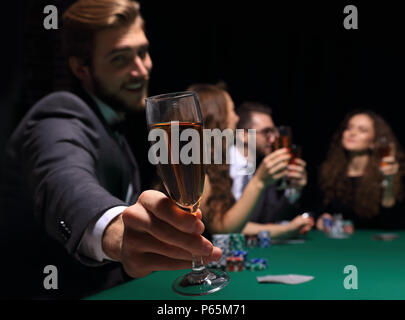 poker player with a glass of wine Stock Photo