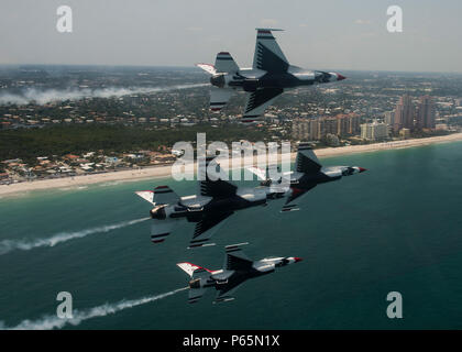 Thunderbirds pilots perform the Diamond Pass and Review maneuver during a practice show in preparation for the Fort Lauderdale Air Show, Ft. Lauderdale, Fla., May 6, 2016. (U.S. Air Force photo/Tech. Sgt. Christopher Boitz) Stock Photo