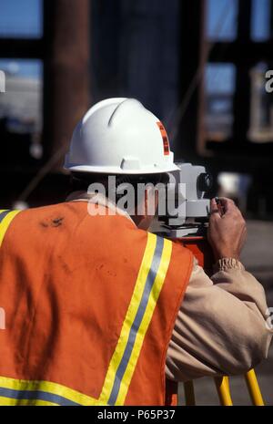 State highway engineer using transit Stock Photo