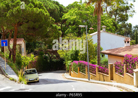 Winding mountain road to the top of the mountain of castle San Juan. Costa Brava, Catalonia, Spain. Architecture of Spanish beach resort Blanes in sum Stock Photo