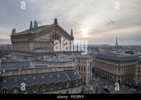 Rooftop view of the Palais Garnier Opera House in Paris France with the Eiffel Tower in the distance Stock Photo