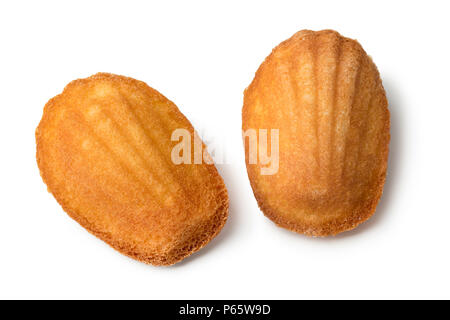 Two traditional fresh baked French madeleines isolated on white background Stock Photo