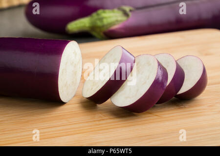 Fresh raw Japanese purple eggplant and slices Stock Photo