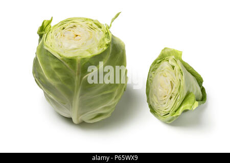 Fresh organic pointed cabbage cut in two pieces isolated on white background Stock Photo