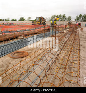 Fabricating steel reinforcement cages for concrete piles. Stock Photo