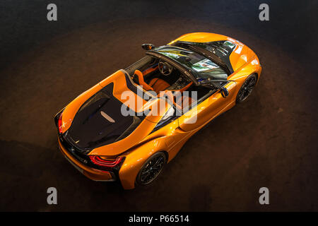 BERLIN - JUNE 09, 2018: Showroom. A plug-in hybrid sports car BMW i8 Roadster. View from above. Stock Photo