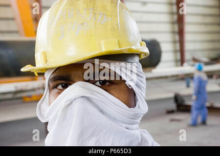 Workers at Hyojong Pipe factory, Doha. Stock Photo