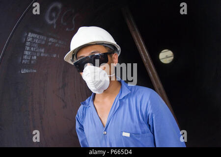 Workers at Hyojong Pipe factory, Doha. Stock Photo