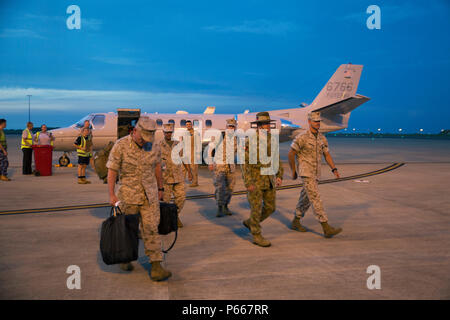 Lt. Gen. Lawrence D. Nicholson, III Marine Expeditionary Force Commanding General, arrives at Royal Australian Air Force Base Darwin, Northern Territory, Australia, May 9, 2016. Nicholson will visit Marines with Marine Rotational Force – Darwin and meet with Australian Defence Force leaders to further strengthen the ADF and U.S. force’s partnership. MRF-D is six-month deployment of Marines to Darwin where they will engage in multiple training exercises alongside their ADF counterparts. Nicholson is from Toronto, Canada. (U.S. Marine Corps photo by Cpl. Carlos Cruz Jr./Released) Stock Photo