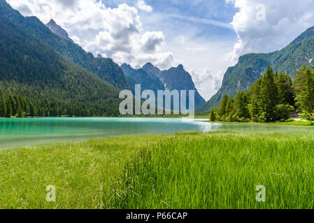 Lake Dobbiaco (Toblacher See, Lago di Dobbiaco) in Dolomite Alps, South Tirol, Italy - Travel destination in Europe Stock Photo