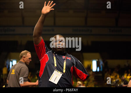 Lamin Manneh, United Kingdom, thanks the crowd for cheering him on during the four minute row event during the 2016 Invictus Games, HP Field House, ESPN Wide World of Sports Complex, Orlando, Fla., May 9.2016. The Invictus Games are an adaptive sports competition which was created by Prince Harry of the United Kingdom after he was inspired by the DoD Warrior Games. This event brings together wounded, ill, and injured service members and veterans from 15 nations for events including: archery, cycling, indoor rowing, powerlifting, sitting volleyball, swimming, track and field, wheelchair basketb Stock Photo