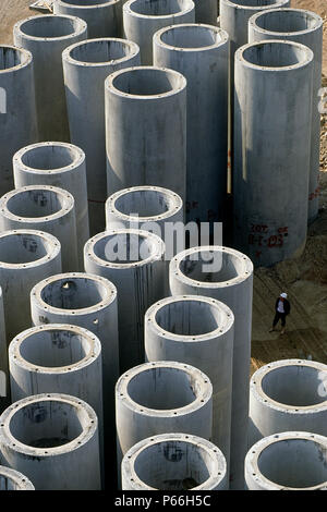 Slipcast reinforced concrete sewage outfall pipes. Piraeus, port of Athens, Greece. Stock Photo