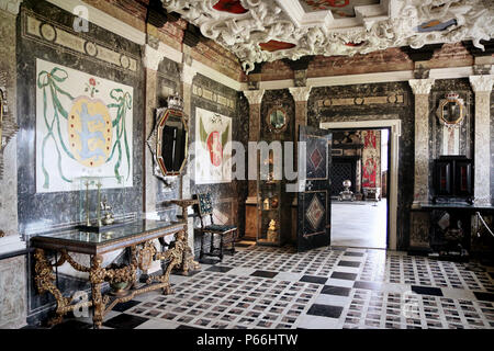 COPENHAGEN, DENMARK - MAY 17, 2018 - The Marble Room in Rosenborg castle in Copenhagen, with white stucco ceiling decorations, coat of arms on the wal Stock Photo