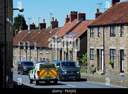 Police car in Thornton-le-Dale, North Yorkshire, England UK Stock Photo
