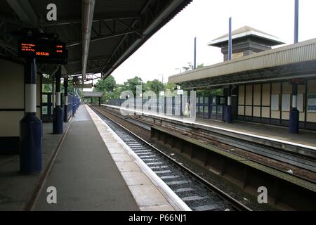 General platform view at Smethwick Galton Bridge station, West Midlands, showing the platform canopies and train annunciator. 2007 Stock Photo