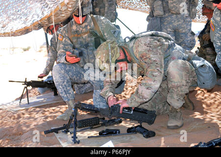 Sgt. Timothy Sharpe, team leader, Co. C, 1st Battalion, 35th Armored Regiment, 2nd Armored Brigade Combat Team, 1st Armored Division Soldiers, practices weapon assembly during the Expert Infantryman's Badge competition, Fort Bliss, Texas, April 13, 2016. Though difficult to achieve, earning the coveted EIB displays Soldiers' proficiency in their specialty and sets them apart from their peers. (U.S. Army photo by Spc. Aura E. Sklenicka, 2/1 ABCT, PAO) Stock Photo