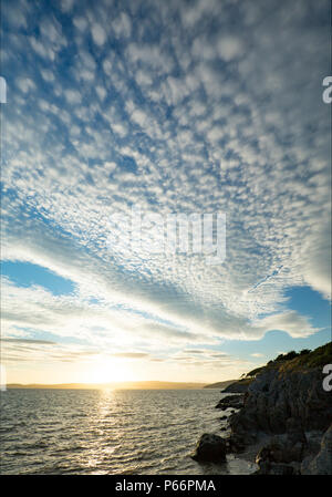 A mackerel sky over Morecambe Bay seen from Jenny Brown’s Point near Silverdale Lancashire England UK GB Stock Photo