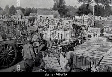 French soldiers load cases of supplies and ammunition to be transported to the frontline during World war One. 1917 Stock Photo