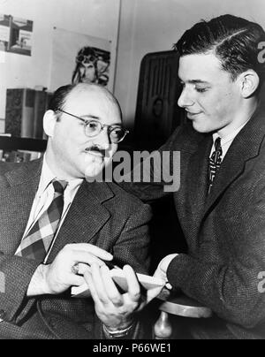 Authors Ellery Queen (left) and James Yaffe. Ellery Queen is both a fictional character and a pseudonym used by two American cousins from Brooklyn, New York—Daniel Nathan, alias Frederic Dannay (October 20, 1905 – September 3, 1982) and Manford (Emanuel) Lepofsky, alias Manfred Bennington Lee (January 11, 1905 – April 3, 1971); to write, edit, and anthologize detective fiction. Stock Photo