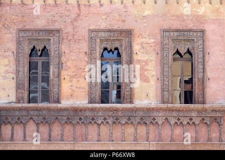 Old window in palace on Piazza Sordello The historic city center of  Mantua, Italy Stock Photo