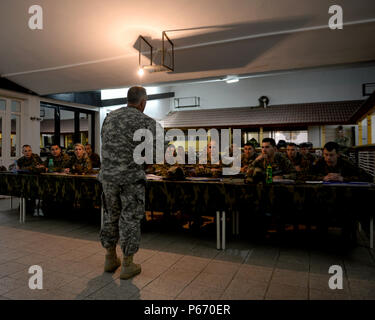 U.S. Army Command Sgt. Maj. Harley Schwind, NATO Headquarters Sarajevo senior enlisted leader, teaches a class to 40 soldiers from the Bosnia and Herzegovina Armed Forces at the Rajlovac Barracks in Sarajevo, BiH, May 11, 2016. Sergeant Major Schwind was briefing as part of the AFBiH Primary Leadership Development Course, a five-week course designed to provide young soldiers with the knowledge and skills to be future NCOs. The sergeant major is a Mandan, N.D., native deployed from the North Dakota Army National Guard. Stock Photo