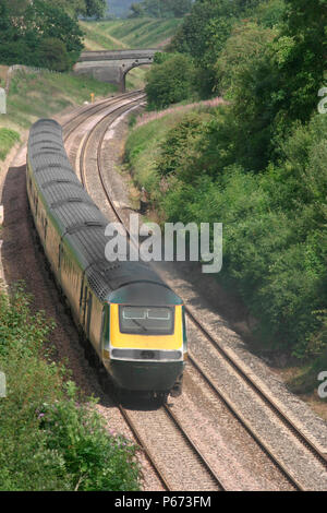 A west bound First Great Western HST approaching Box in Wiltshire on the line from London to Bath and Bristol. August 2004 Stock Photo