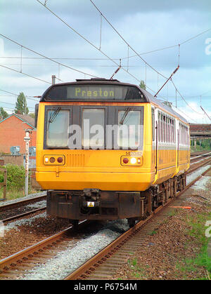 The Merseyrail services operating out of Liverpool Lime St extend beyond the Mersey area such as this local service to Preston seen arriving at Leylan Stock Photo