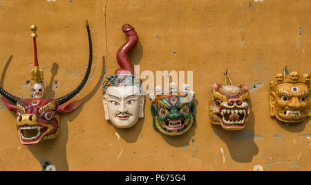 Famous bhutanese character masks - colorful mask from bhutanese religion characters Stock Photo