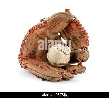 old vintage baseball glove with the baseball held in the palm isolated over white background Stock Photo