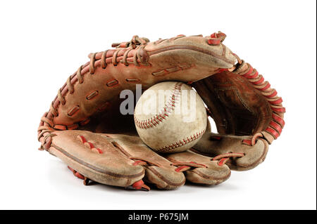 old vintage baseball glove with the baseball held in the palm isolated over white background Stock Photo
