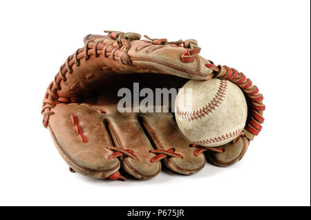 old vintage baseball glove with the baseball held in the palm isolated over white background Stock Photo