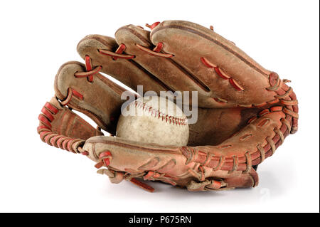 old vintage baseball glove with the baseball held in the palm isolated over white background Stock Photo