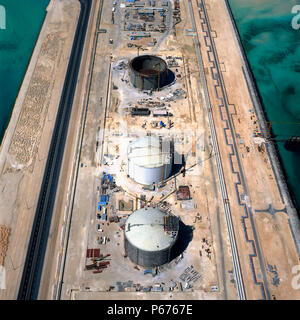 Aerial view LNG Storage tanks under construction in Qatar Liquid Natural Gas refinery near Doha. Stock Photo