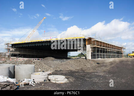 All the composite bridge sections in place that will be the over pass on the completed junction Stock Photo