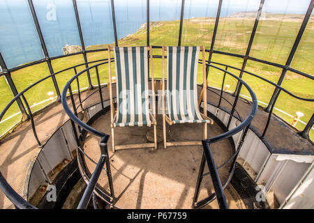 Two deckchairs at the top of Old Light Lighthouse on Lundy Island Stock Photo