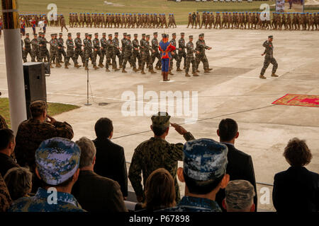 A multinational formation of troops conduct a pass in review during the opening ceremony for Khaan Quest 2016, at Five Hills Training Area, Mongolia, May 22, 2016. Khaan Quest is an annual, multinational peacekeeping operations exercise conducted in Mongolia and is the capstone exercise for this year's United Nations Global Peace Operations Initiative program. (U.S. Marine Corps photo by Cpl. Hilda M. Becerra / Released) Stock Photo