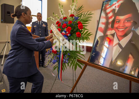 Airmen from the 89th Airlift Wing and families attend a memorial service for Tech. Sgt. Melinda Hargrove, 89th Maintenance Group, at Joint Base Andrews, Md., April 25, 2016. Hargrove passed away April 17. After nearly 20 years of Active Duty service, she was set to retire within the year. (U.S. Air Force photo by Senior Master Sgt. Kevin Wallace/RELEASED) Stock Photo